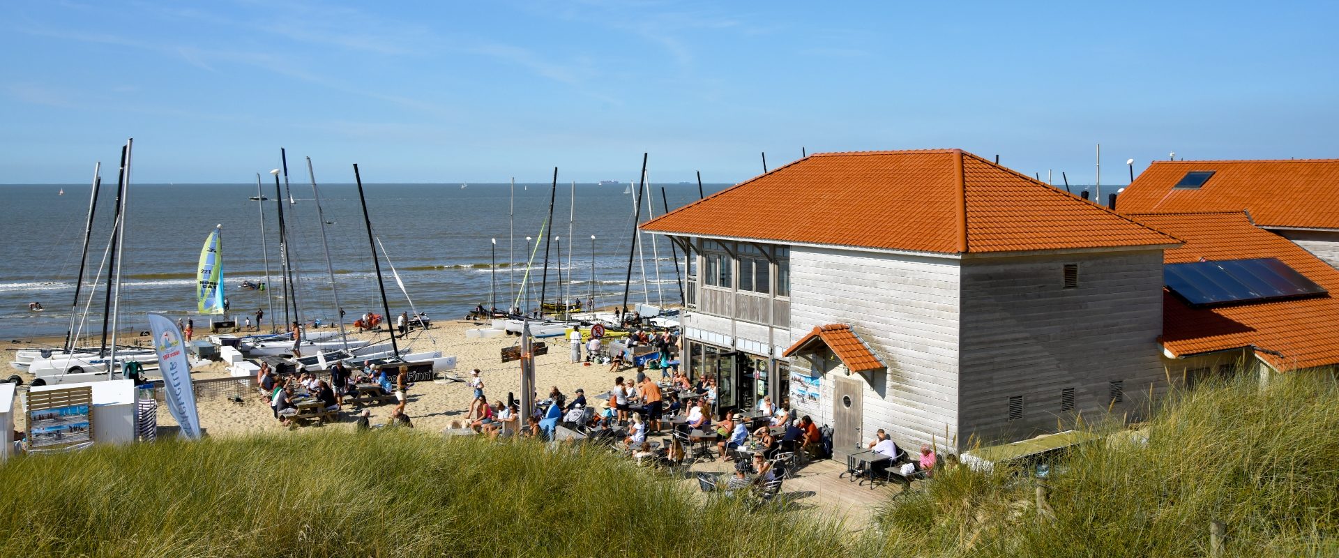 Strand en zee De Kruishoeve De Haan - strandclub Vosseslag